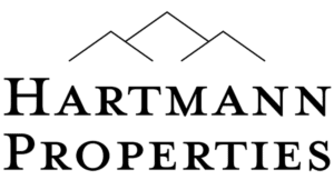 Black logo of Hartmann Properties